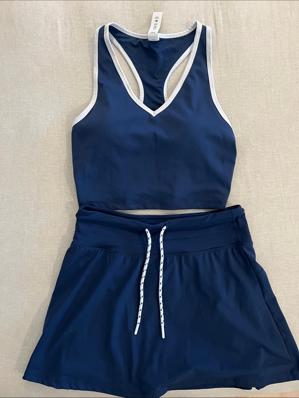 90 Degree By Reflex Navy Crop Racerback Top and Skort Set with White Trim